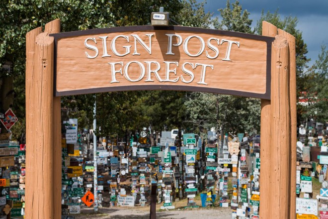 Alaska Highway Sign Post Forest